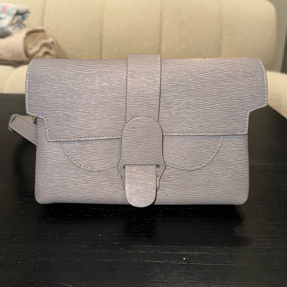 Senreve crossbody, there isa lil mark inside other than that